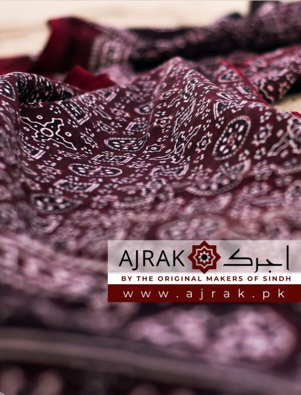 This beautiful Maroon Jileb ajrak fabric showcases the skill and dedication of the artisans who created it