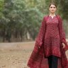 Model wearing Gulzar Ajrak silk 2-piece suit in maroon tones